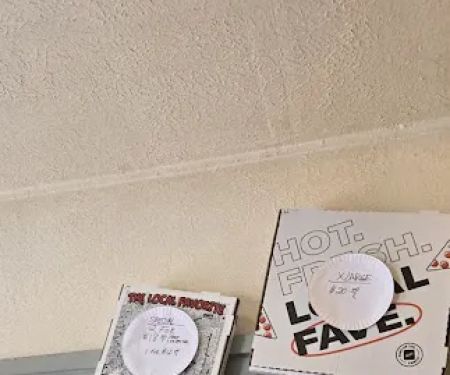 Fuhgeddaboudit Pizzeria Cafe